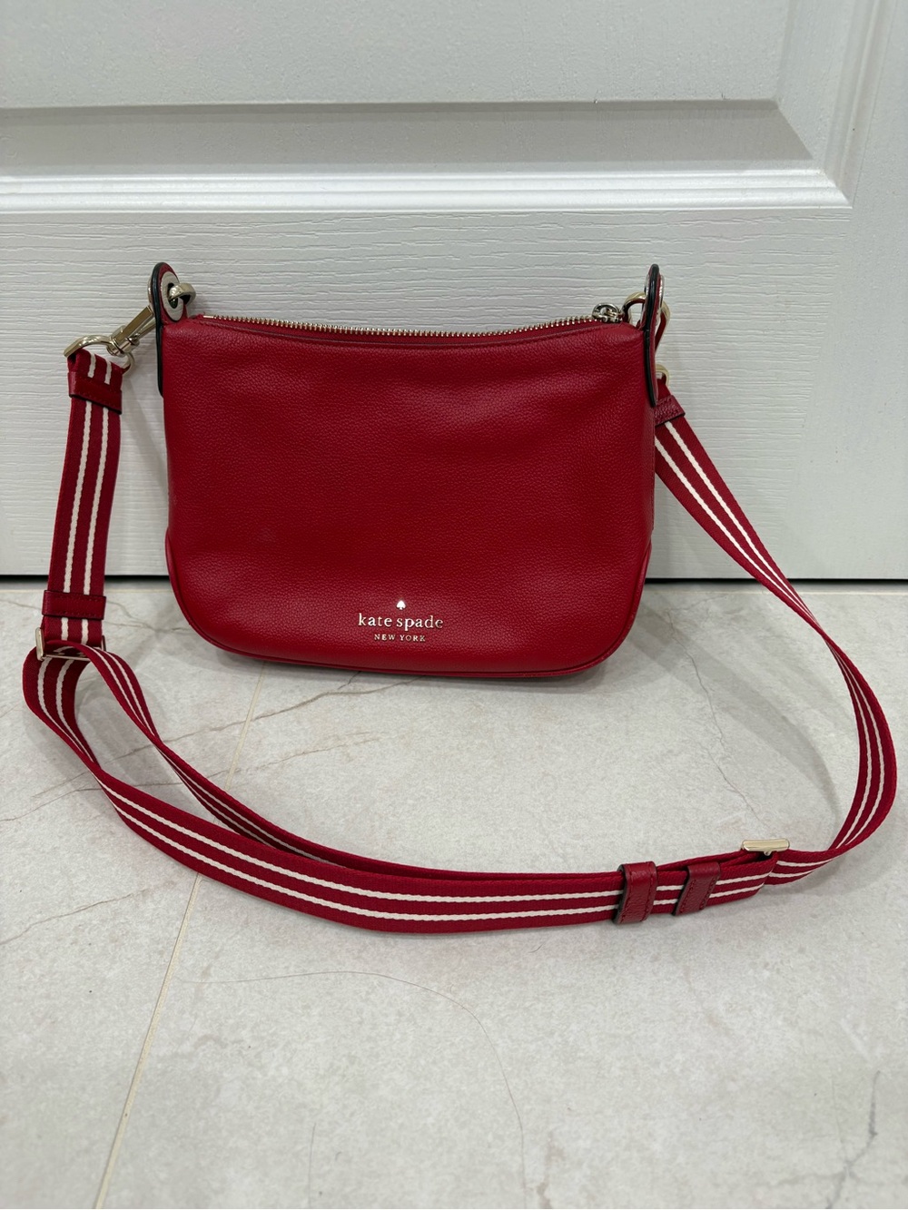 kate spade red leather crossbody with striped adjustable strap